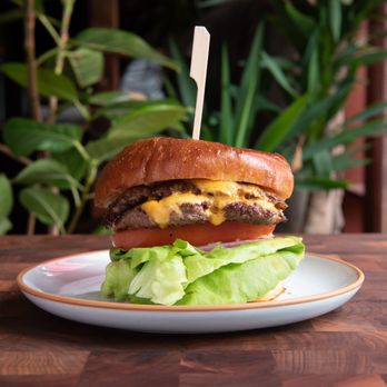 Swagyu Burger - a hamburger with lettuce and cheese - Burgers Near Me - Newport Beach, California