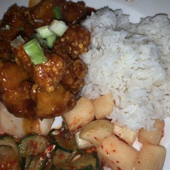Kogi Korean Grill - Orange Chicken with turnip and cucumber kimchi - Korean Near Me - San Antonio, Texas Kogi Korean Grill - Orange Chicken with turnip and cucumber kimchi - Korean Near Me - San Antonio, Texas