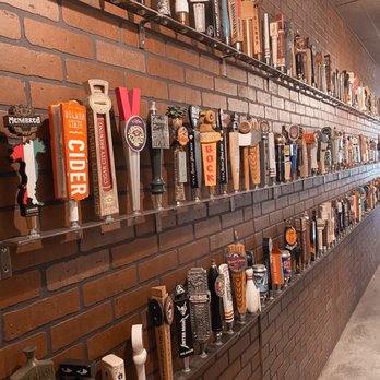 Brew N Chew - a wall full of beer taps - Pizza Near Me - Redlands, California Brew N Chew - a wall full of beer taps - Pizza Near Me - Redlands, California