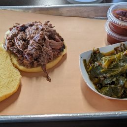 Brisket sandwich and collard greens Brisket sandwich and collard greens