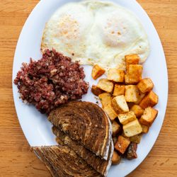 The Heritage Breakfast with egg, hash, home fries and your choice of toast.
