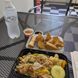 Fried tofu, veggie egg roll, spicy basil fried rice Fried tofu, veggie egg roll, spicy basil fried rice