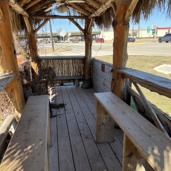 Taqueria Ruby - a porch with benches and a thatched roof - Breakfast & Brunch Near Me - Houston, Texas Taqueria Ruby - a porch with benches and a thatched roof - Breakfast & Brunch Near Me - Houston, Texas