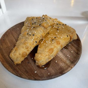Meraki Greek Bistro - Honey & Sesame Cheese Puffs - Greek Near Me - Miami, Florida Meraki Greek Bistro - Honey & Sesame Cheese Puffs - Greek Near Me - Miami, Florida