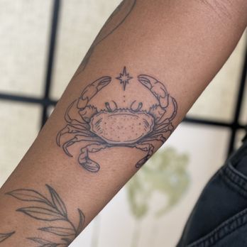 1. InkCrafters Tattoo Studio