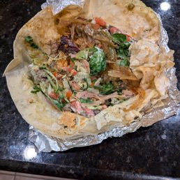 The green isn't cilantro - maybe spring mix? (not on our order) The green isn't cilantro - maybe spring mix? (not on our order)