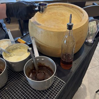 19seventy - The cheese wheel with pappardelle noodles and short ribs ready for preparing. - Italian Near Me - Whittier, California 19seventy - The cheese wheel with pappardelle noodles and short ribs ready for preparing. - Italian Near Me - Whittier, California