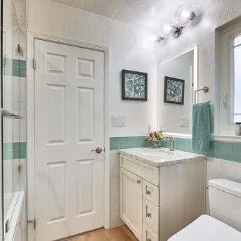 HArts Design+Build Kitchen and Bath - Woodford Bathroom with new flooring, heated towel rack, LED medicine cabinet, new vanity countertops, and Toto electric bidet - Cabinetry Near Me - San Jose, California HArts Design+Build Kitchen and Bath - Woodford Bathroom with new flooring, heated towel rack, LED medicine cabinet, new vanity countertops, and Toto electric bidet - Cabinetry Near Me - San Jose, California