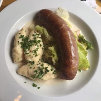 Cafe Katja - emmentaler sausage (with savoy cabbage and quark cheese dumplings) - German Near Me - New York, New York Cafe Katja - emmentaler sausage (with savoy cabbage and quark cheese dumplings) - German Near Me - New York, New York