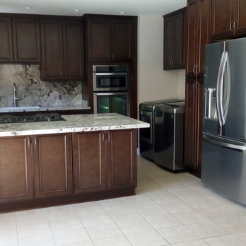 West Coast Custom Stonework - Granite countertops and backsplash, with a seamless flow and perfect sink cut-out - Flooring Near Me - Sun Valley, California West Coast Custom Stonework - Granite countertops and backsplash, with a seamless flow and perfect sink cut-out - Flooring Near Me - Sun Valley, California