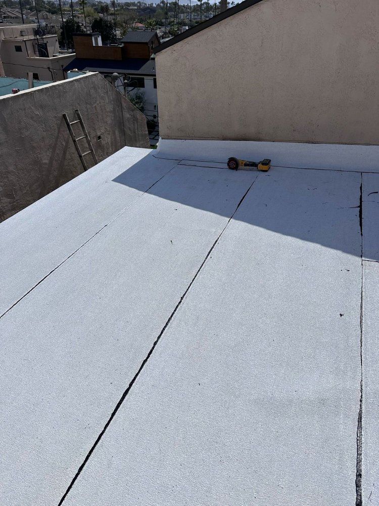 Slide of Tecun’s Roofing