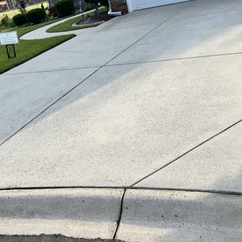Longitude Roofing and Improvements - After power washing driveway. - Roofing Near Me Longitude Roofing and Improvements - After power washing driveway. - Roofing Near Me