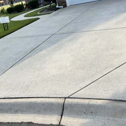 Longitude Roofing and Improvements - After power washing driveway.