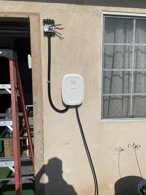 EV charger - Installed a Electrical Vehicle charger Level 2 for customer ran wiring through the attic to the back into the panel