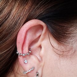 Fine Line Tattoo & Piercing - Very happy with my third earlobe piercing