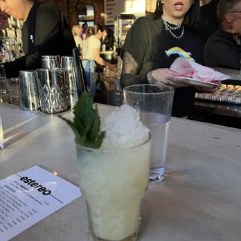 Estereo - a woman serving a drink at a bar - Beer, Wine & Spirits Near Me - Chicago, Illinois