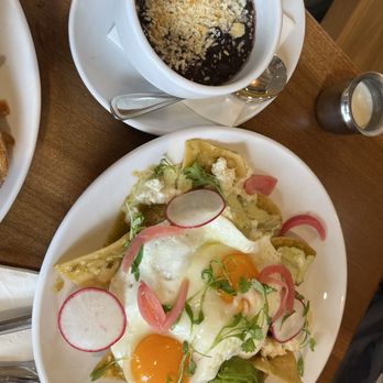 Poached Kitchen - Chilaquiles and beans - Coffee & Tea Near Me - Anaheim, California Poached Kitchen - Chilaquiles and beans - Coffee & Tea Near Me - Anaheim, California
