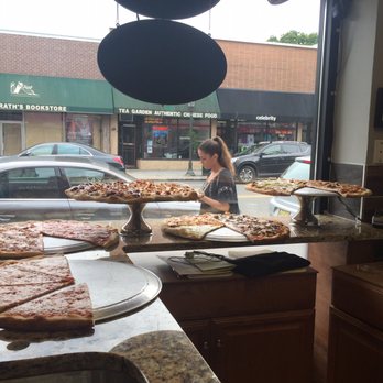 Paulie's Pizza & Wings - a woman in the window - Chicken Wings Near Me - Tenafly, New Jersey Paulie's Pizza & Wings - a woman in the window - Chicken Wings Near Me - Tenafly, New Jersey