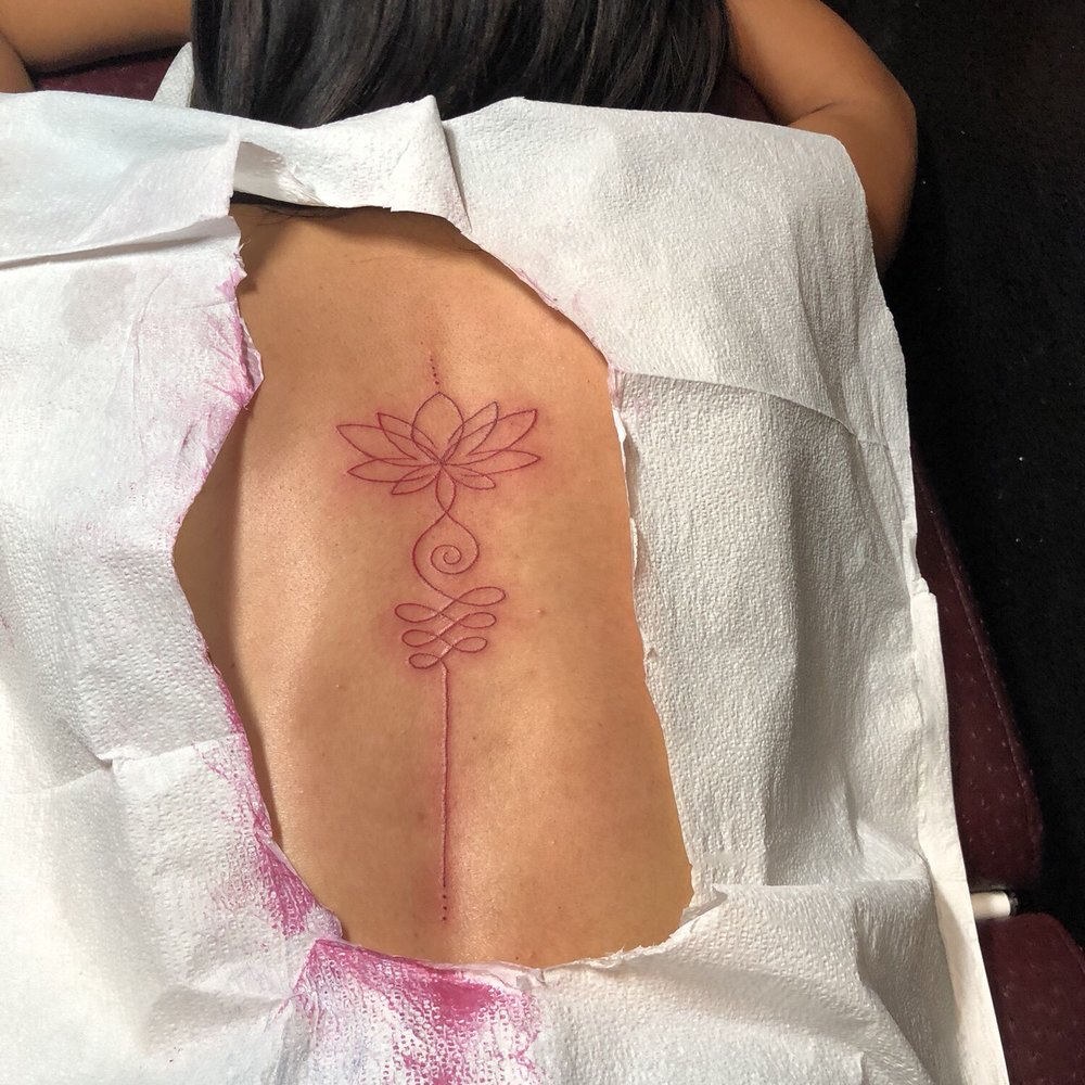 Pink Lotus with the birth of the primordial symbol of the Divine Feminine...