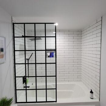 John's Home Remodeling & Construction - Completed Condo bath remodel with new custom printed glass shower. - General Contractors Near Me - Chicago, Illinois