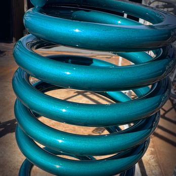 Amalfi Powder Coating - Automotive suspension spring powder coated in a custom teal finish for durability, corrosion resistance, and standout style. - Powder Coating Near Me - Phoenix, Arizona Amalfi Powder Coating - Automotive suspension spring powder coated in a custom teal finish for durability, corrosion resistance, and standout style. - Powder Coating Near Me - Phoenix, Arizona