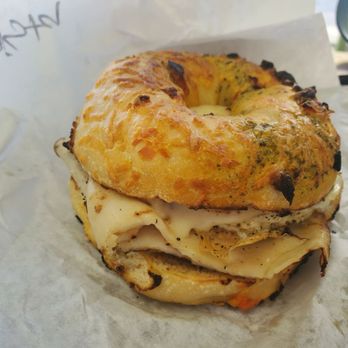 Desert Sun Bagel - The Vista- Turkey breast, Swiss, and fresh cracked egg on garlic parmesan bagel - Bagels Near Me - Reno, Nevada Desert Sun Bagel - The Vista- Turkey breast, Swiss, and fresh cracked egg on garlic parmesan bagel - Bagels Near Me - Reno, Nevada