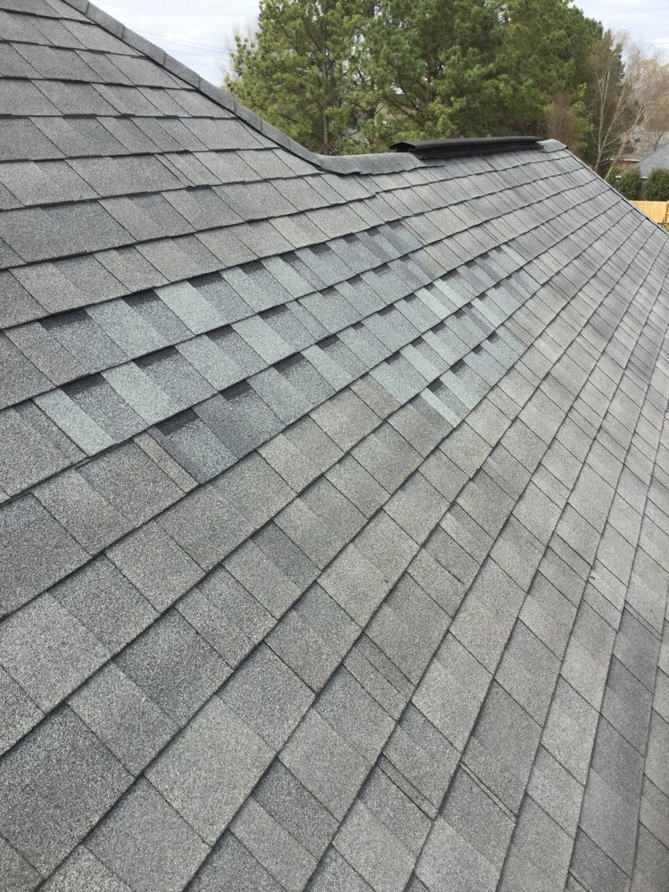 Slide of Woodward Roofing