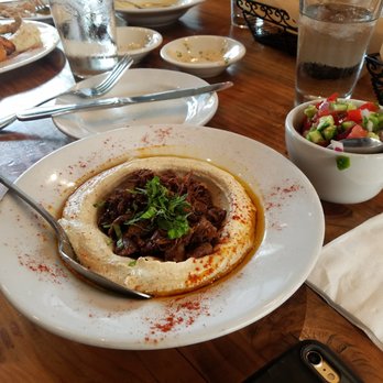 Oren's Hummus - Hummus Lamb:  Hummus with pomegranate braised lamb shoulder with fresh mint ($17) - Mediterranean Near Me - Cupertino, California