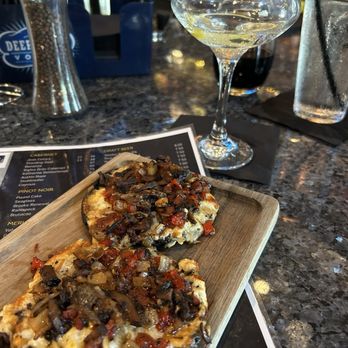 Rivulet Kitchen & Bar - Fig and pancetta crostini - Bars Near Me - Boerne, Texas Rivulet Kitchen & Bar - Fig and pancetta crostini - Bars Near Me - Boerne, Texas