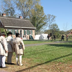 Bergen County Historical Society - The Campbell-Christie House at Historic New Bridge Landing with reenactors at an event.