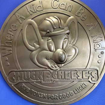 Chuck E. Cheese - a close up of a medal - Pizza Near Me - San Diego, California Chuck E. Cheese - a close up of a medal - Pizza Near Me - San Diego, California