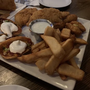 Fibbar MaGees - Potato Skins, Chicken Strips, jalapeño poppers,and steak fries in the sampler plate - Irish Pub Near Me - Sunnyvale, California