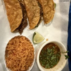 San Marcos Mex Grill & Cantina - Quesabirria tacos with rice. Favor was perfect!
