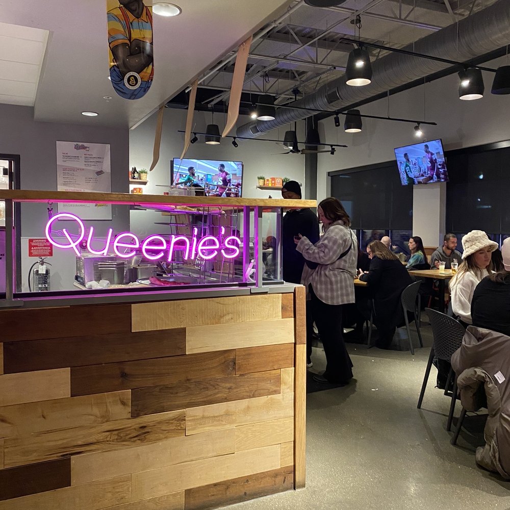 Queenie's Pizza Factory - people sitting at tables - Pizza Near Me - Carmel, Indiana Queenie's Pizza Factory - people sitting at tables - Pizza Near Me - Carmel, Indiana