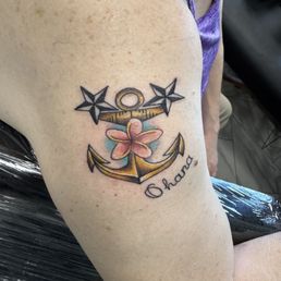 Memorial tattoo for my dad who was in the Navy for 21 years and the flower is for my mom who loved plumerias and everything Hawaiian. Memorial tattoo for my dad who was in the Navy for 21 years and the flower is for my mom who loved plumerias and everything Hawaiian.