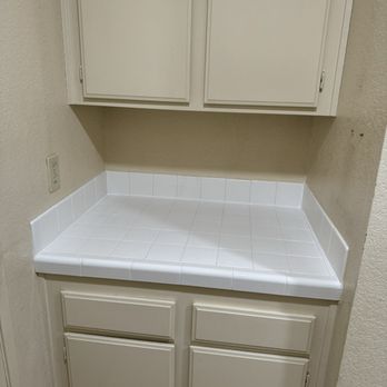 The Groutsmith - Restored countertop tile in laundry room. - Grout Services Near Me - San Marcos, California The Groutsmith - Restored countertop tile in laundry room. - Grout Services Near Me - San Marcos, California