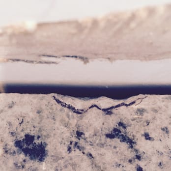 Arco-Iris Granite - a closeup of the edge of a window sill - General Contractors Near Me - Erlanger, Kentucky Arco-Iris Granite - a closeup of the edge of a window sill - General Contractors Near Me - Erlanger, Kentucky