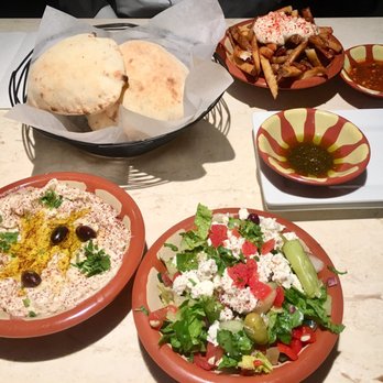 Tanoor - Babaghanough, sides: batata harra and salad. On the house bread with olive oil - Lebanese Near Me - Sammamish, Washington Tanoor - Babaghanough, sides: batata harra and salad. On the house bread with olive oil - Lebanese Near Me - Sammamish, Washington