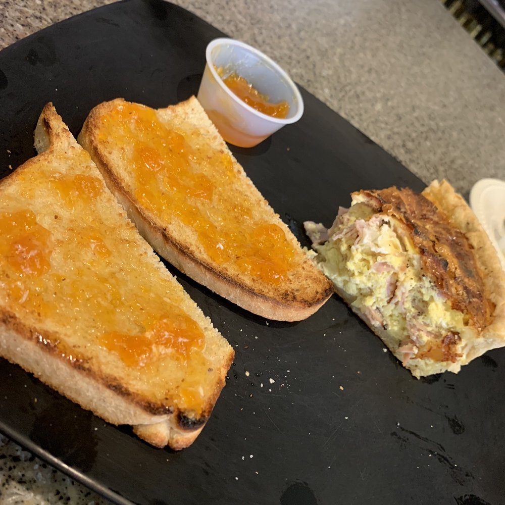Red Rock Bakery & Net Cafe - two sandwiches on a black plate - Bakeries Near Me - Moab, Utah Red Rock Bakery & Net Cafe - two sandwiches on a black plate - Bakeries Near Me - Moab, Utah