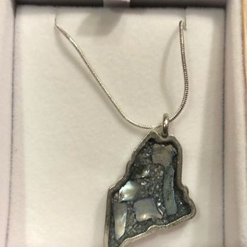 Indigo Blues - a silver pendant with a picture of a woman - Home Decor Near Me - Bar Harbor, Maine Indigo Blues - a silver pendant with a picture of a woman - Home Decor Near Me - Bar Harbor, Maine