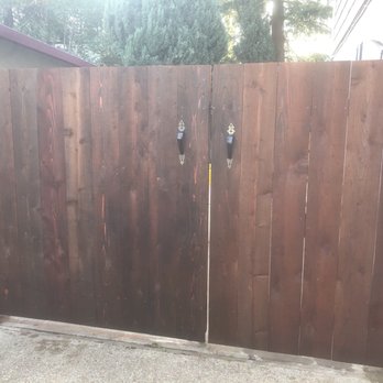Joses Fencing & Decking - Front of double gate. We stained this ourselves after jose installed it. - Fences & Gates Near Me Joses Fencing & Decking - Front of double gate. We stained this ourselves after jose installed it. - Fences & Gates Near Me