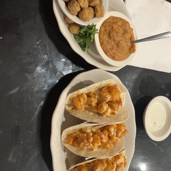 Cedar River Seafood - Shrimp tacos !!! Shrimp tossed in boom boom with wet coleslaw ( Jessica's suggestion)! Fried okra and mashed sweet potatoes!