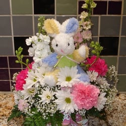 John Edward Price Flowers & Gifts - Arrangement for a new baby and her family.