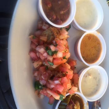Fish City Grill - The "welcome wagon" red beans and rice, creamy jalapeño soup, crab bisque, clam chowder and shrimp gumbo with oyster nachos. - Seafood Near Me - Georgetown, Texas Fish City Grill - The "welcome wagon" red beans and rice, creamy jalapeño soup, crab bisque, clam chowder and shrimp gumbo with oyster nachos. - Seafood Near Me - Georgetown, Texas