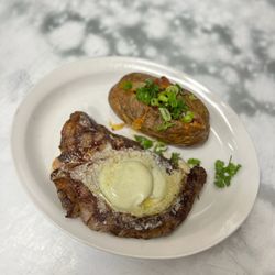 Center Street Grill - 9oz Steak Special: Blu Cheese butter and loaded baked potato