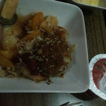 Delta Air Lines - Baked oatmeal with hot fruit and fresh fruit ...this was delicious! - Airlines Near Me - Denver, Colorado