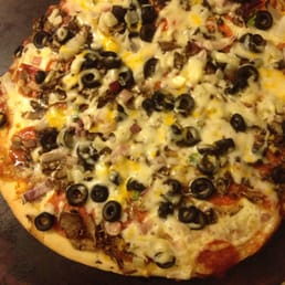 Fresh out of the oven, baked on my pizza stone. Cheese and crust were perfect! Fresh out of the oven, baked on my pizza stone. Cheese and crust were perfect!