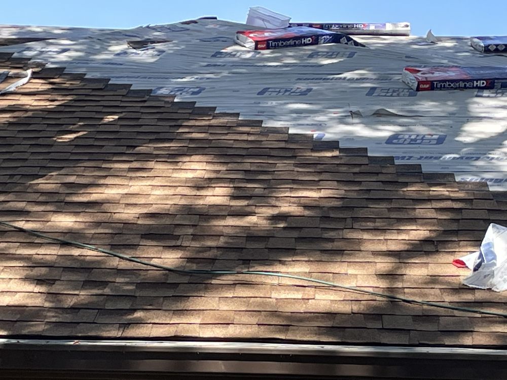 Slide of Restoration Roofing & Remodeling