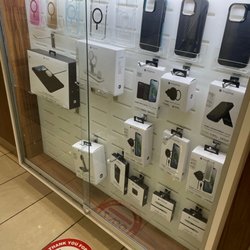 ZAGG Stonebriar Mall - Cabinet with some of their products they sell.