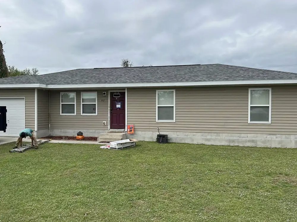 Slide of HP Storm Restoration - Roofing Company